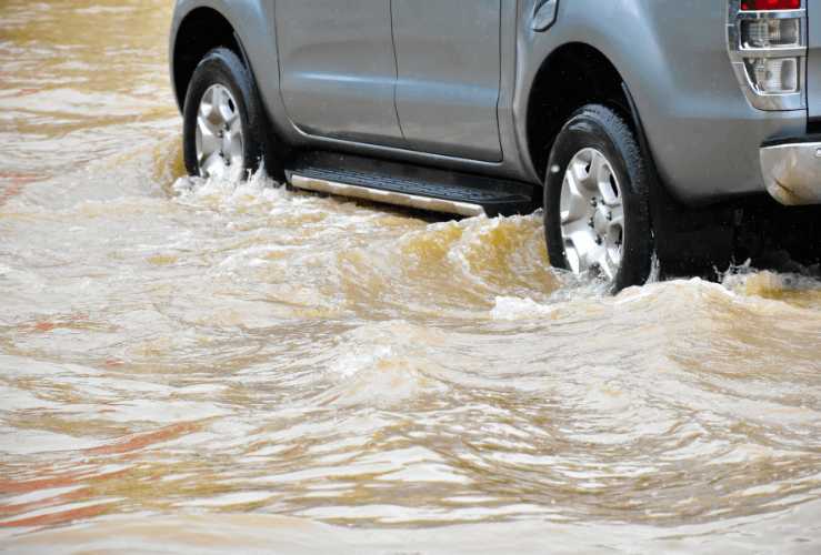 Car driving in flash flood