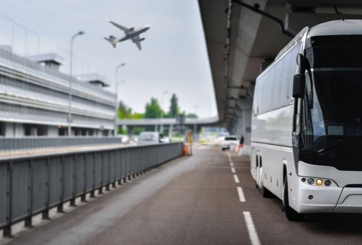 Coach parked outside airport