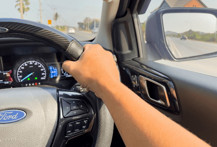 Interior shot of dashboard and steering wheel on a Ford