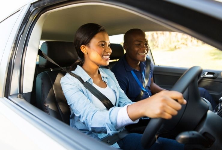 Young girl on a driving lesson