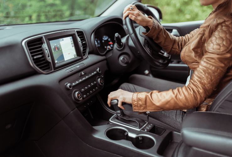 Young girl reversing car