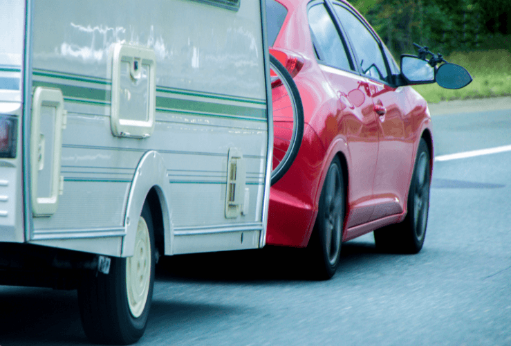 Car towing caravan