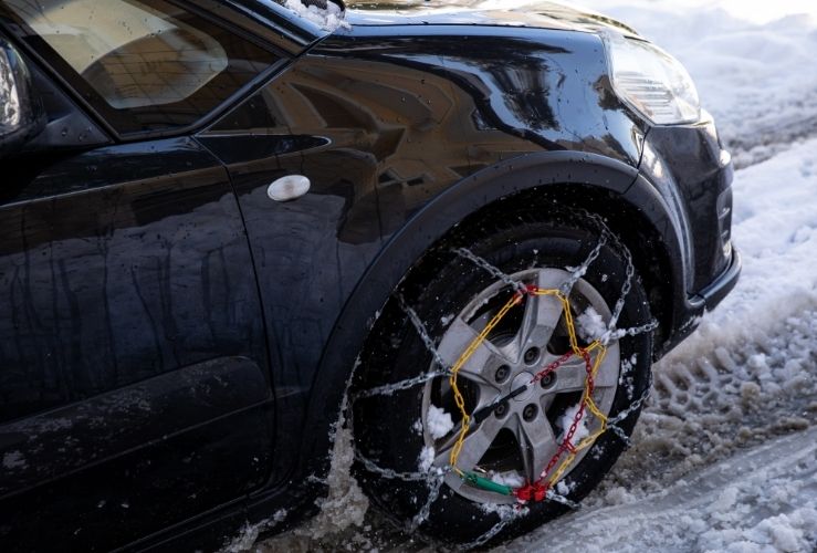 Snow chains on car