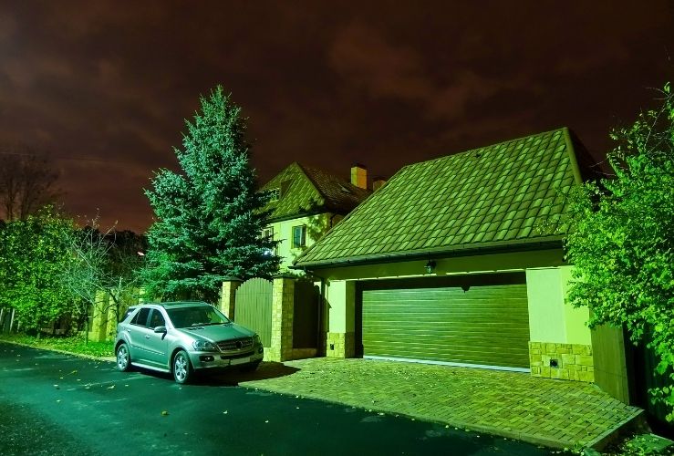 Car parked on street at night