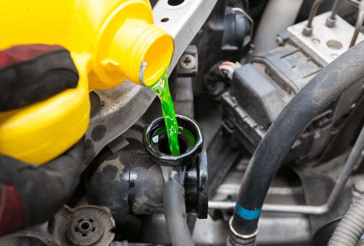 Adding coolant to car engine