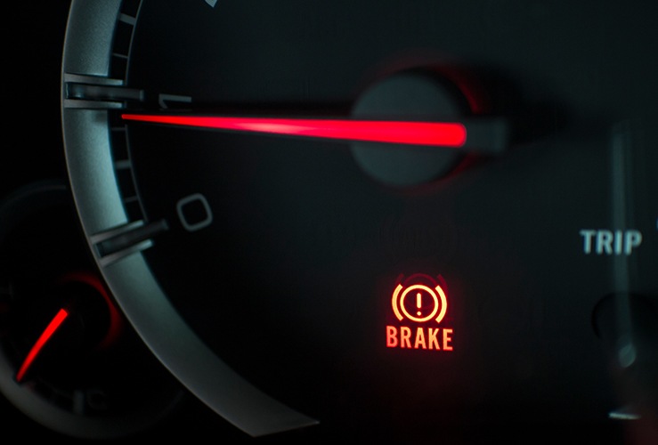 Handbrake light on car dashboard