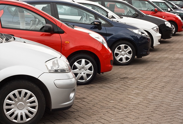 Row of used cars at dealership