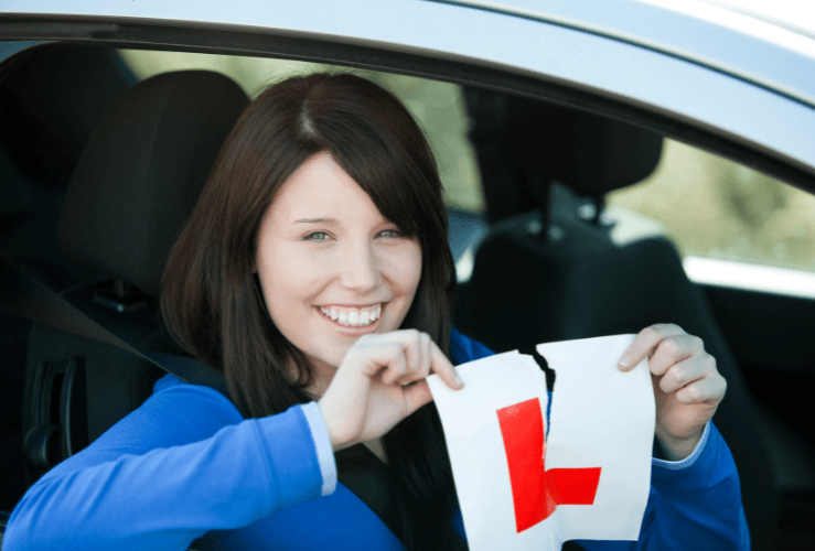 Learner driver ripping up L plate after passing test