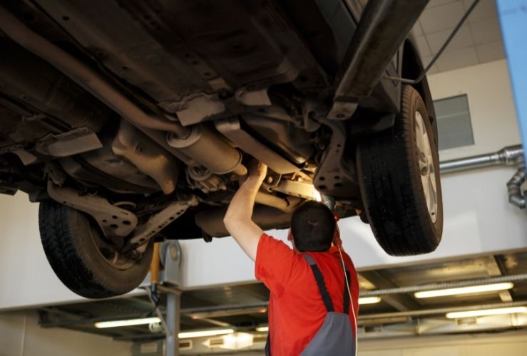 Mechanic at work in garage